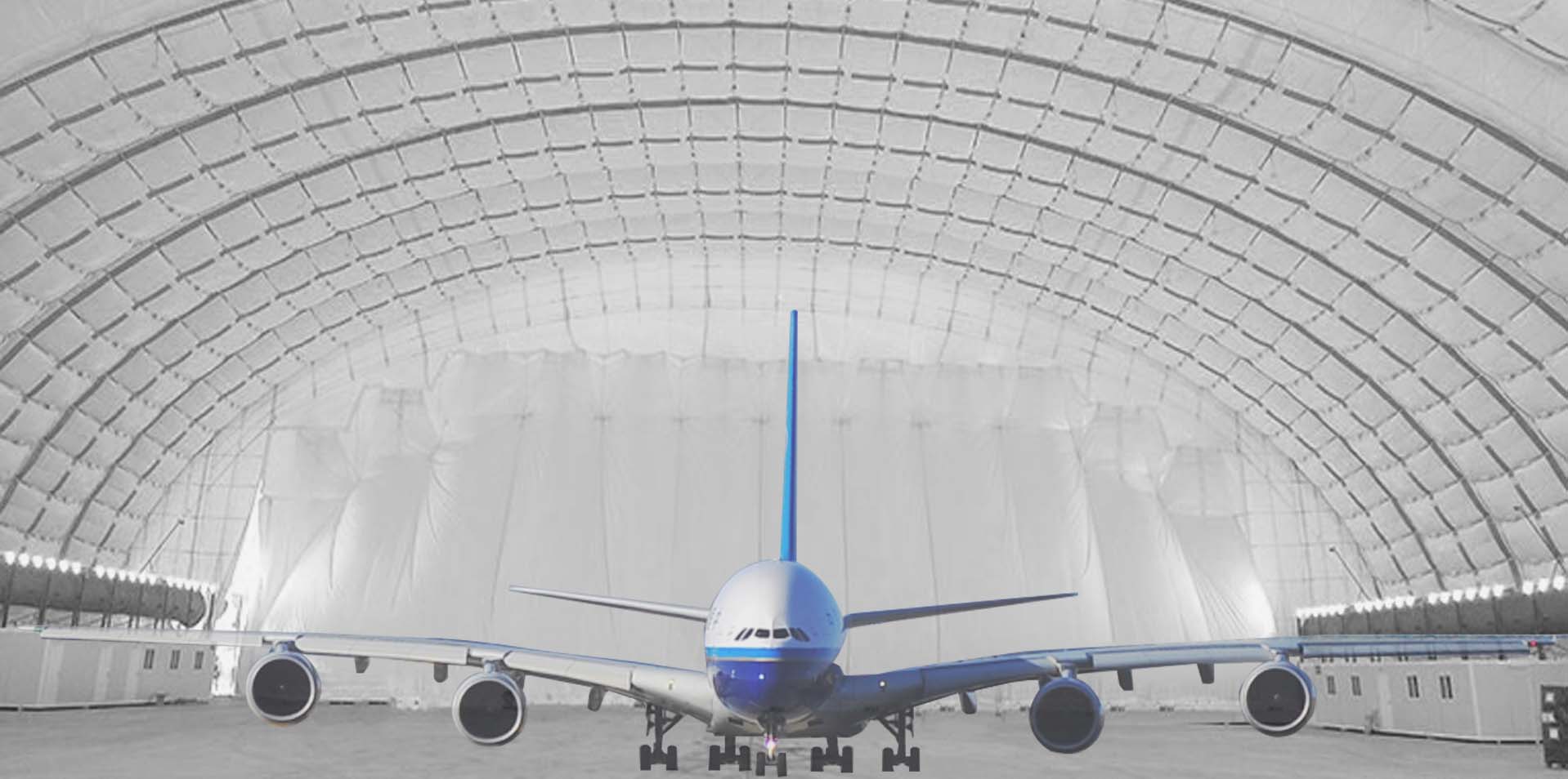 Inflatable aircraft hangar at night